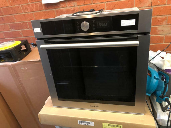 Hotpoint SI4 854 C IX Oven How Can I Clean The Glass Inside The Oven Door?